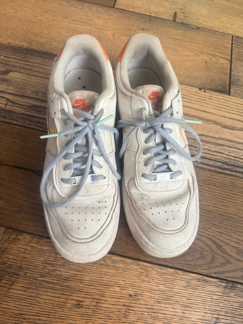 Nike Air Force 1 Low White with Light Blue Laces and Orange Accents
